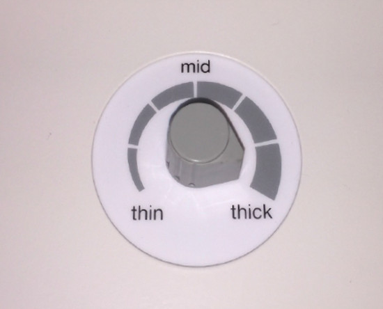 VARIABLE SUCTION - The air pressure select knob allows adjustment of air suction for different weights of paper