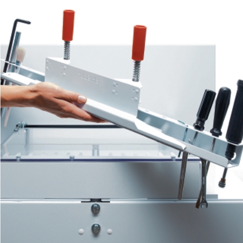 TOOL HOLDER - Convenient, drop-in tool holder is located on the rear of the machine and keeps all tools necessary for routine maintenance (including blade changes) within reach 